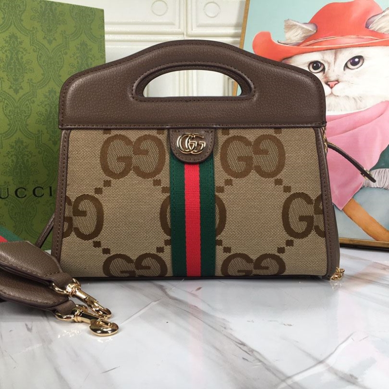 G*u*i top handle bags
